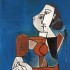 Пабло Пикассо «Женщина в красном костюме на синем фоне»